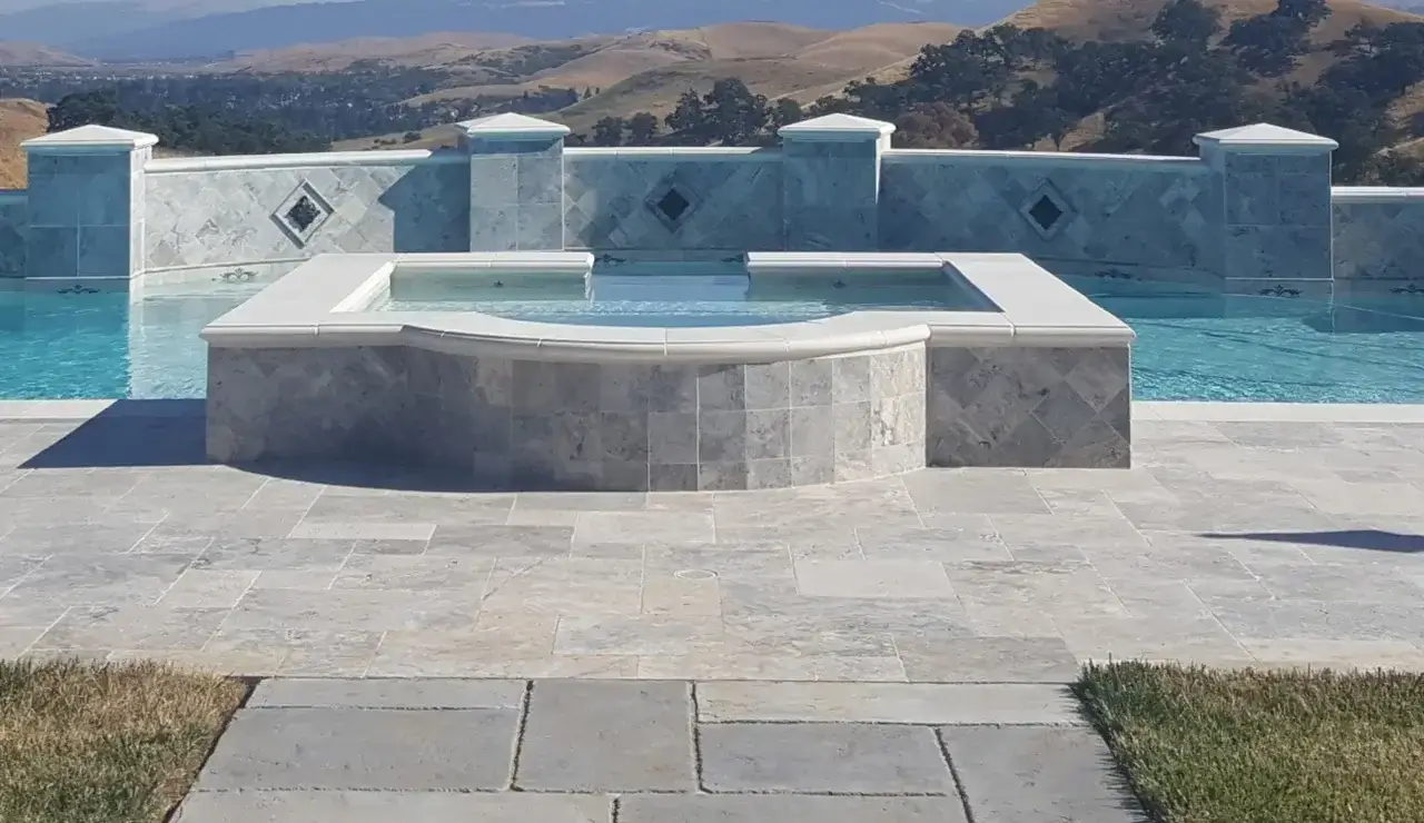 Hot tub and inground pool from Aqua Dream Pools of California.